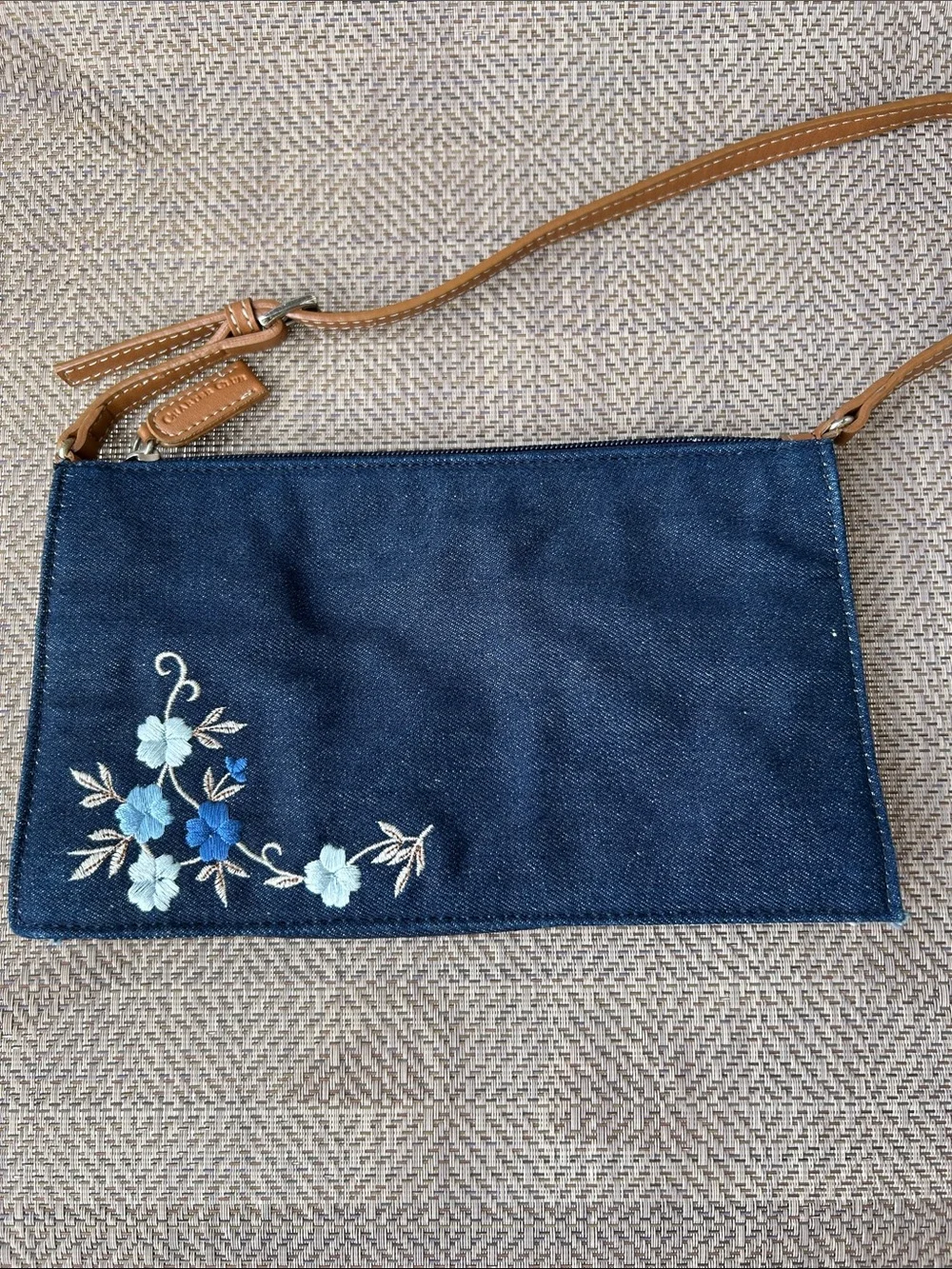 Charter Club Navy Denim mini bag with Blue Floral Embroidery and Tan Strap.